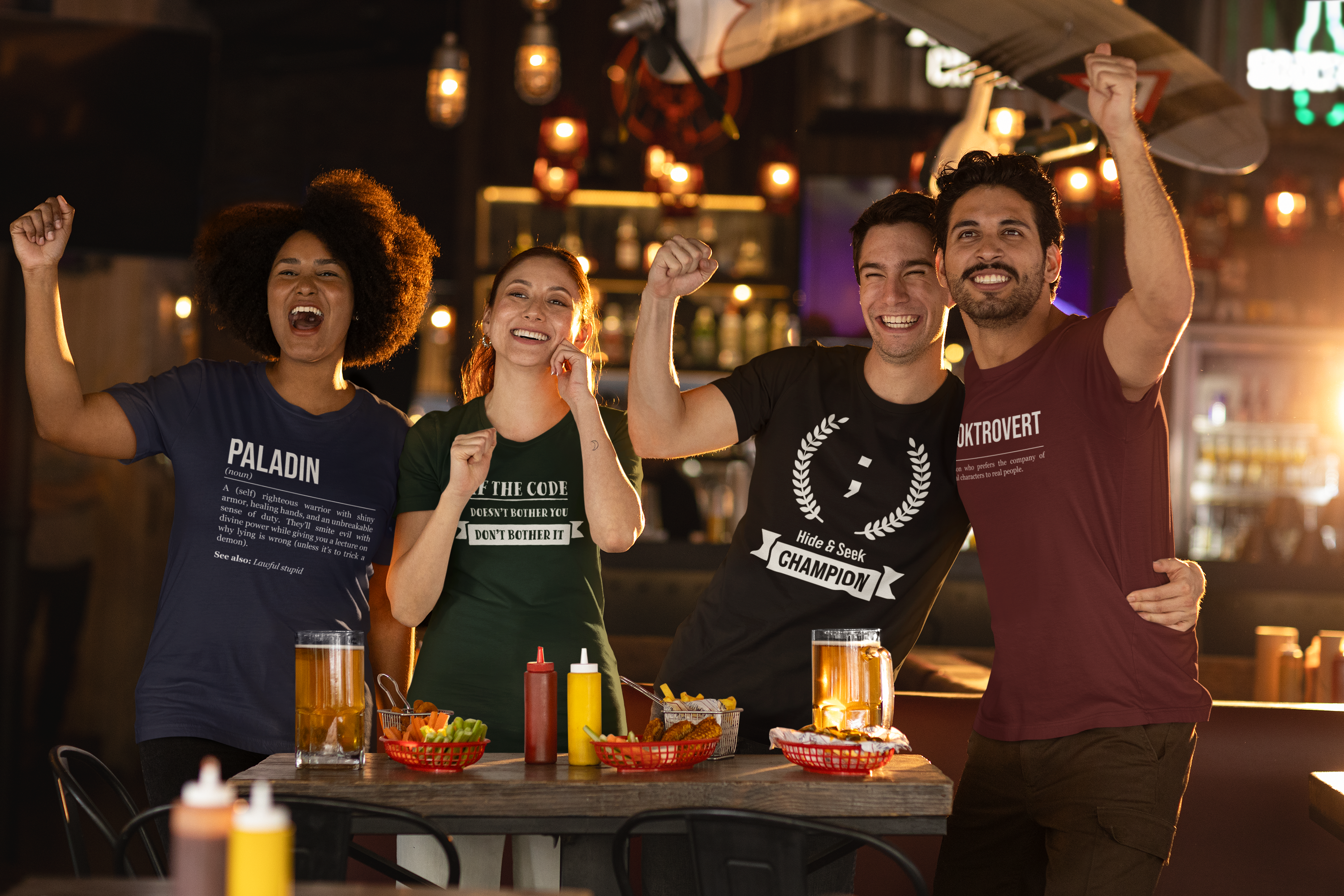 Group of friends, men and women, having fun at a bar, wearing geeky t-shirts